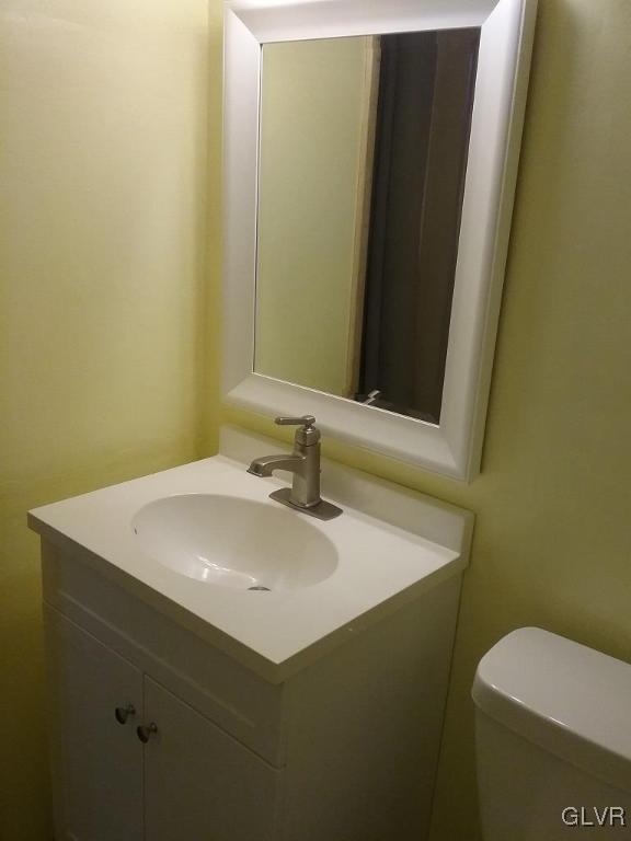 135 Longley Road Nazareth, PA 18064 - Photo 23 of 35 a bathroom with a sink toilet and mirror