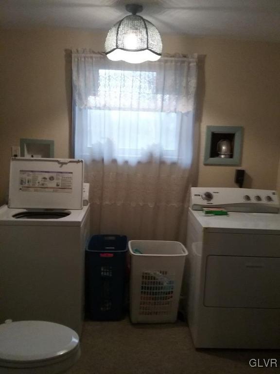 135 Longley Road Nazareth, PA 18064 - Photo 24 of 35 a bathroom with a toilet a sink and a window