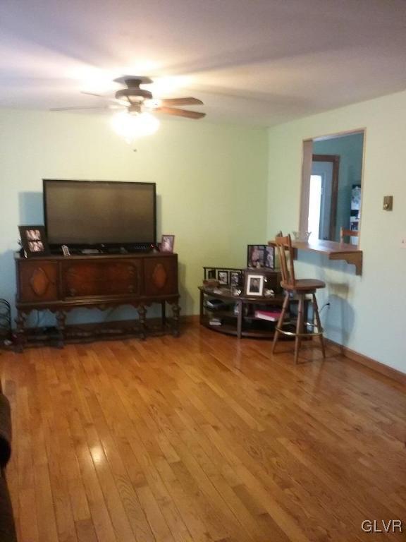 135 Longley Road Nazareth, PA 18064 - Photo 8 of 35 a living room with furniture and a flat screen tv