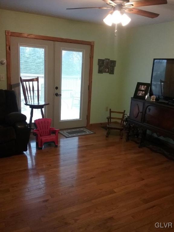 135 Longley Road Nazareth, PA 18064 - Photo 9 of 35 a living room with furniture window and wooden floor