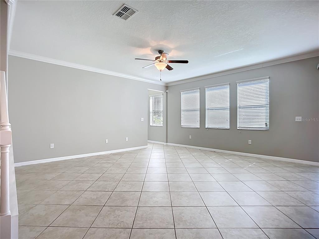 14240 Blue Dasher Drive Riverview, FL 33569 - Photo 13 of 66 a view of an empty room with a window