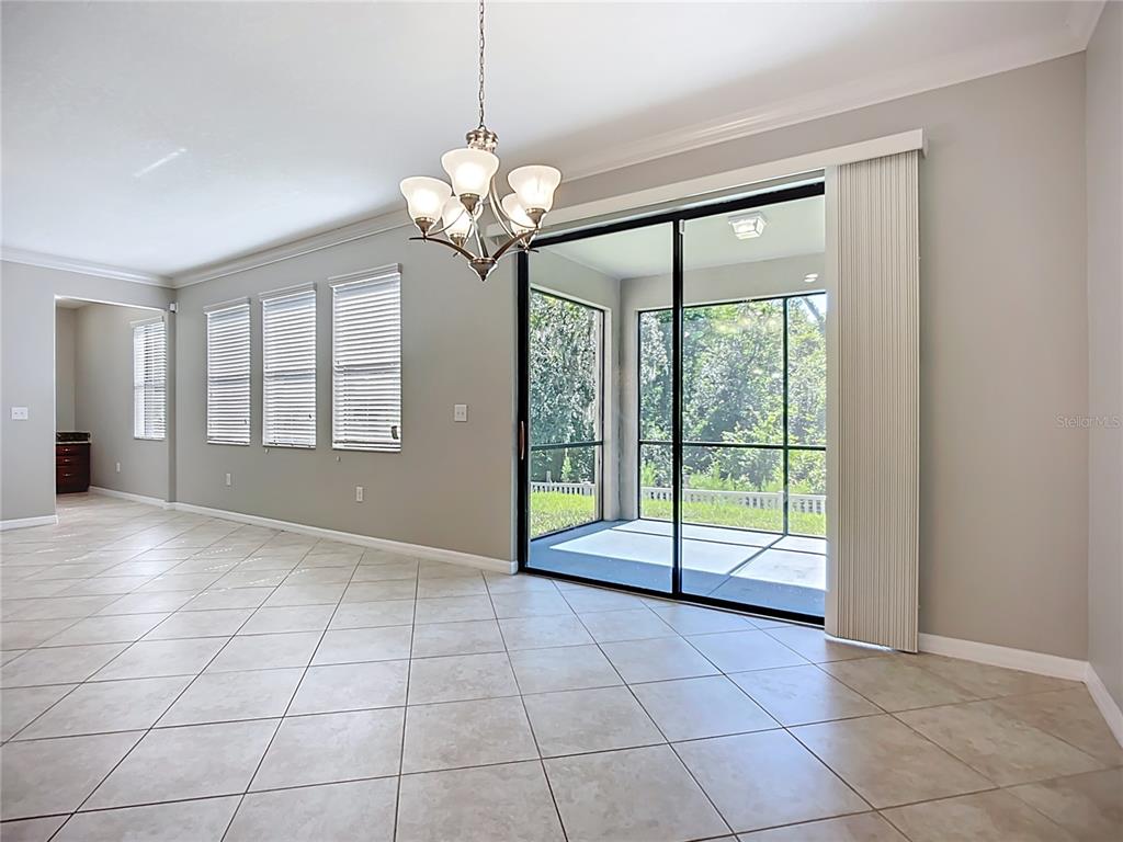 14240 Blue Dasher Drive Riverview, FL 33569 - Photo 16 of 66 a view of an empty room with a window