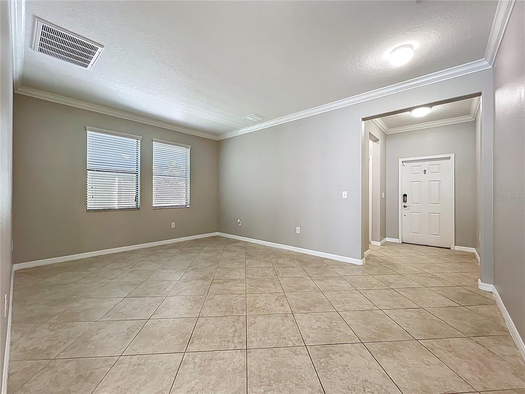 14240 Blue Dasher Drive Riverview, FL 33569 - Photo 32 of 66 a view of an empty room and window