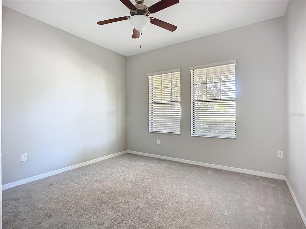 14240 Blue Dasher Drive Riverview, FL 33569 - Photo 35 of 66 a view of an empty room with a window