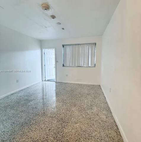 an empty room with a natural light