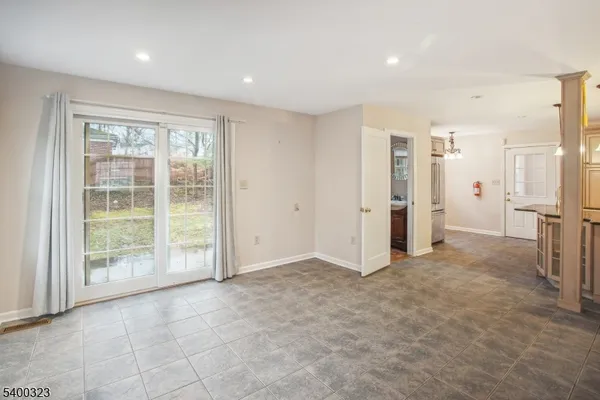 a view of empty room with windows