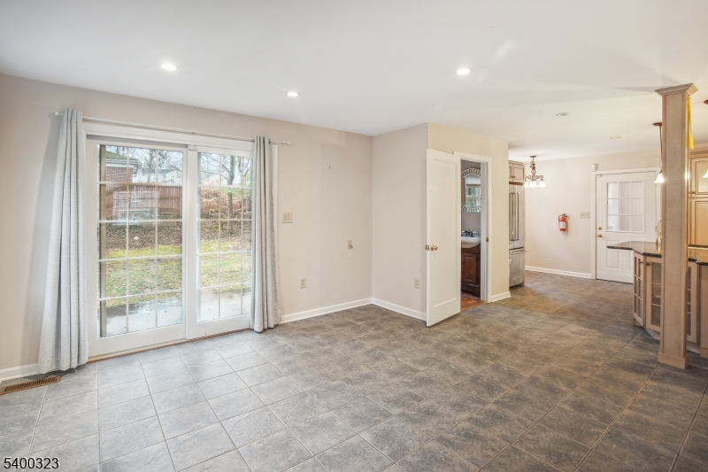 49 Madison Avenue Summit, NJ 07901 - Photo 9 of 15 a view of empty room with windows