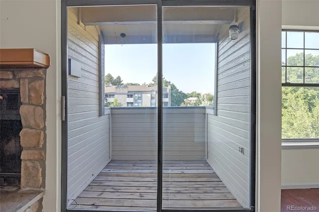 a view of a terrace with a garden
