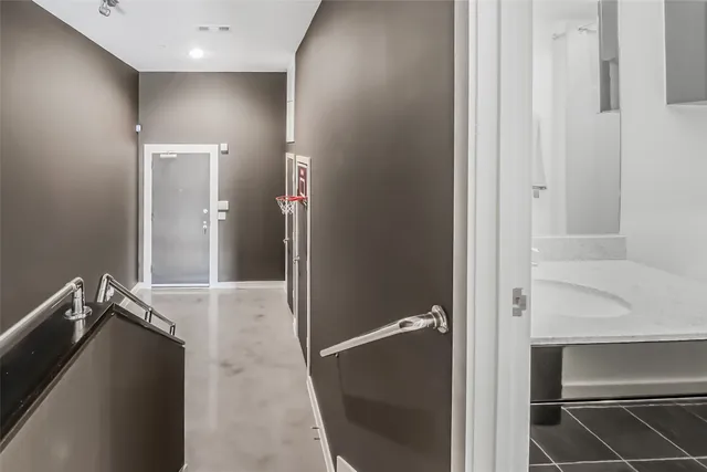 a view of kitchen with furniture and windows