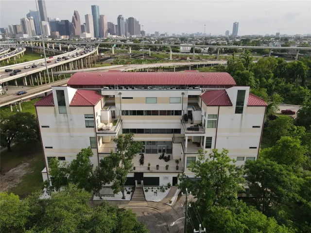 a view of a city with tall buildings