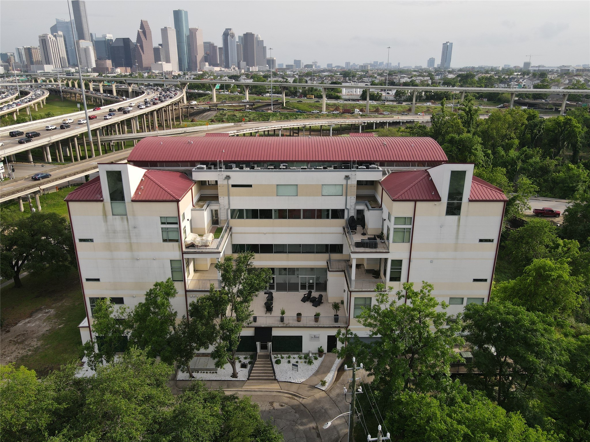 102 Quitman Street, Unit 301 Houston, TX 77009 - Photo 3 of 33 a view of a city with tall buildings