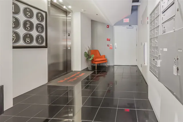 a view of a hallway with closet