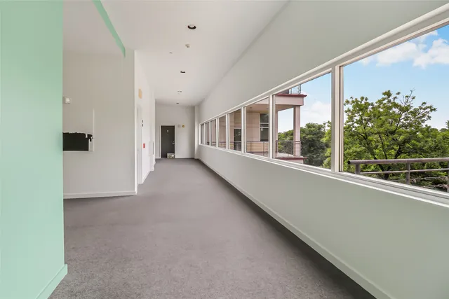 a view of livingroom with washer and dryer