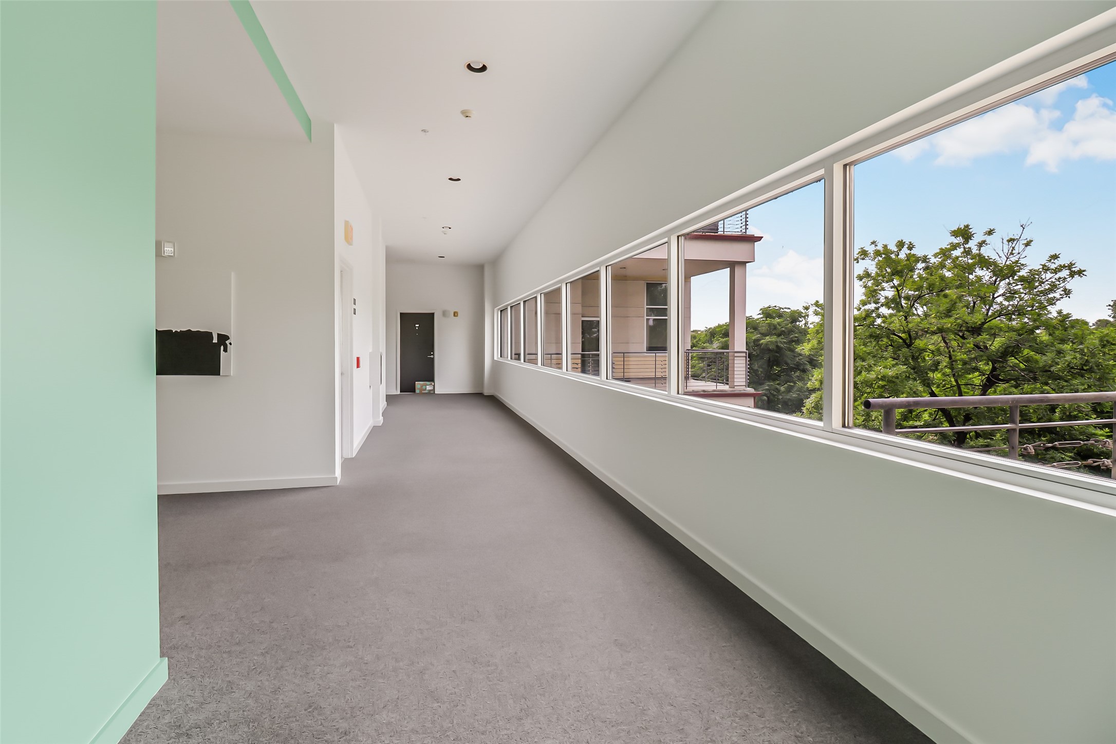 102 Quitman Street, Unit 301 Houston, TX 77009 - Photo 9 of 33 a view of an empty room with a window