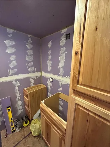 a bathroom with a tub and shower