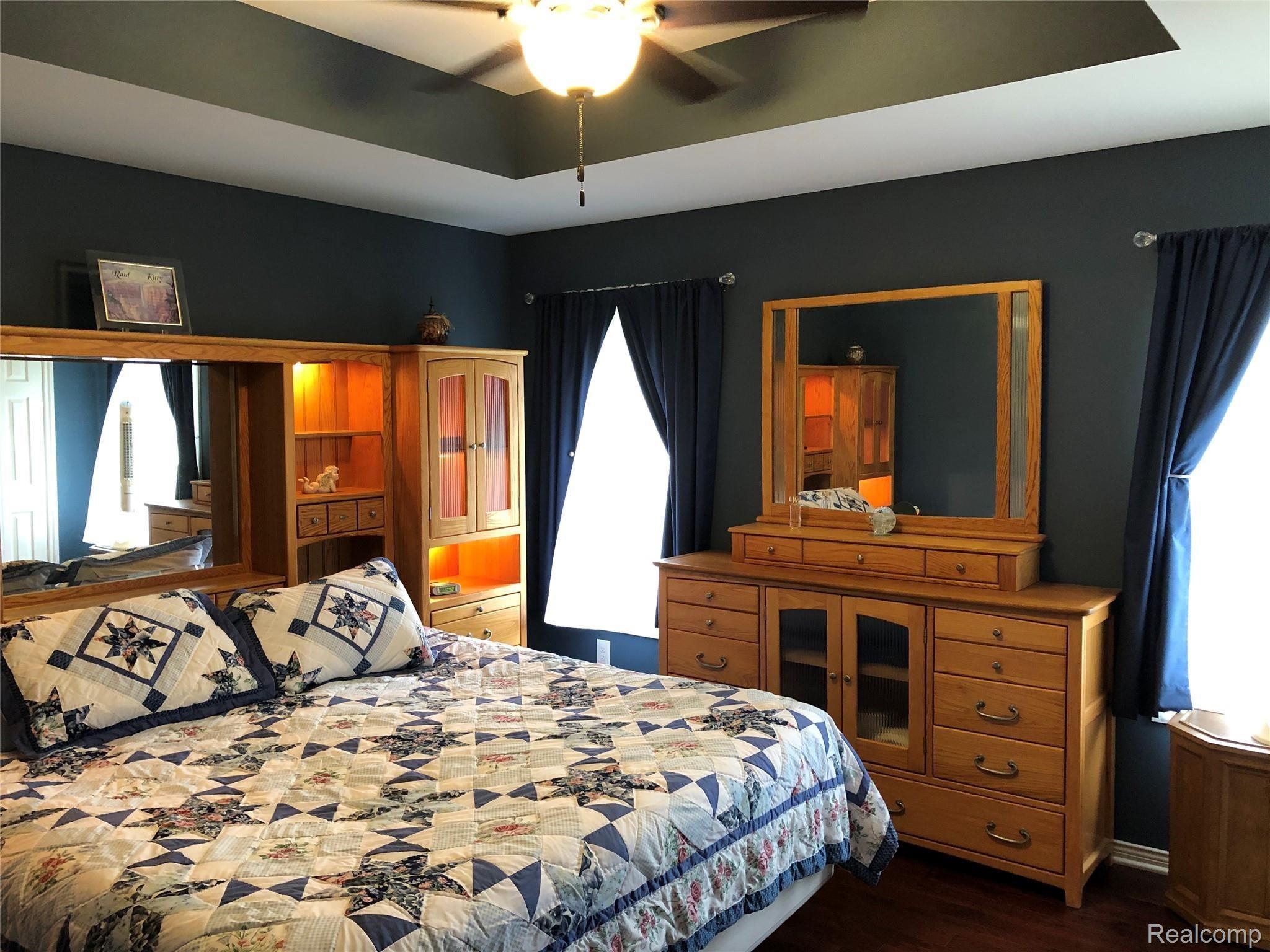4960 Glover Road Almont, MI 48003 - Photo 19 of 35 Spacious master bedroom with staggered ceiling heights and ceiling fan