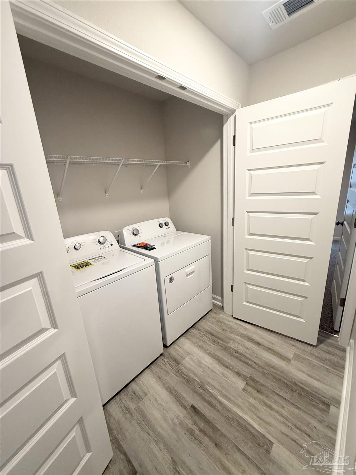 4335 Redbay Court Pace, FL 32571 - Photo 23 of 30 a utility room with dryer and washer