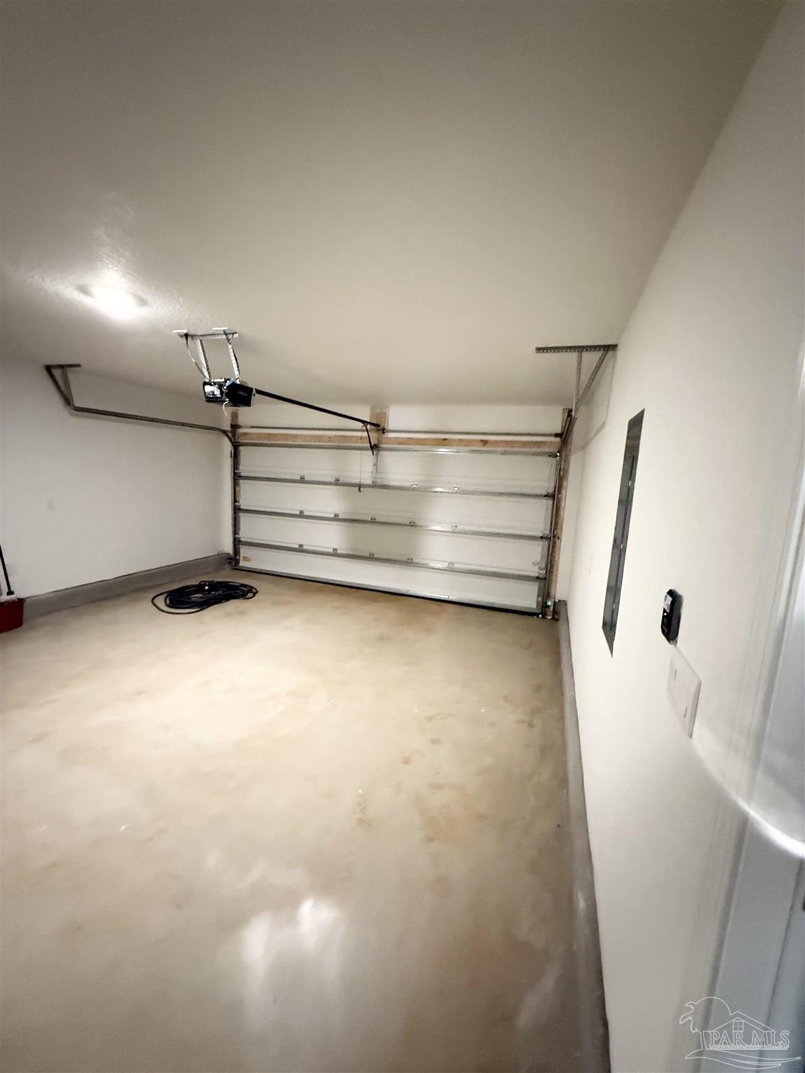 4335 Redbay Court Pace, FL 32571 - Photo 24 of 30 a view of a room with racks on the wall