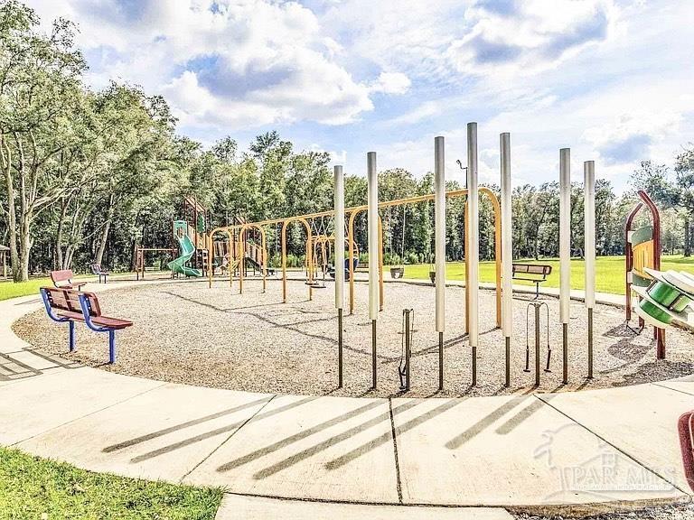 4335 Redbay Court Pace, FL 32571 - Photo 29 of 30 a view of tall trees