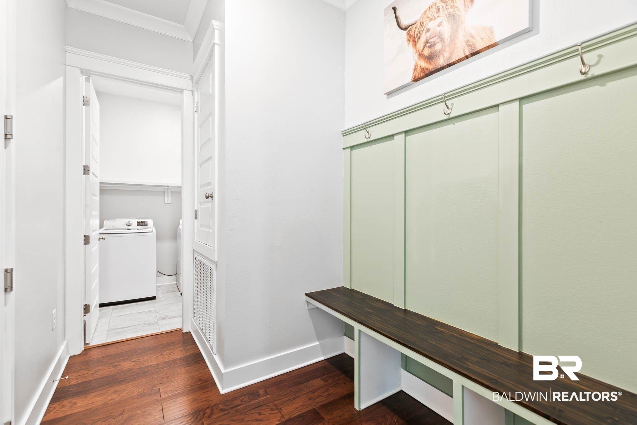 12785 Warbler Street Daphne, AL 36527 - Photo 31 of 53 Mudroom featuring washer / clothes dryer, dark wood-style floors, and crown molding