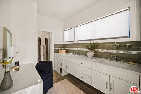 a kitchen with a sink and counter top space