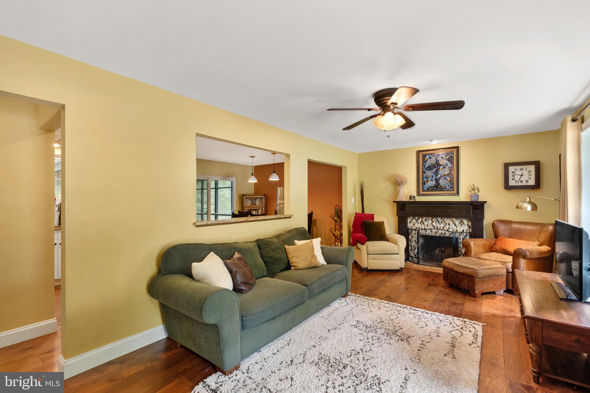 8206 Springfield Village Drive Springfield, VA 22152 - Photo 11 of 46 Cozy wood burning fireplace with custom mantle