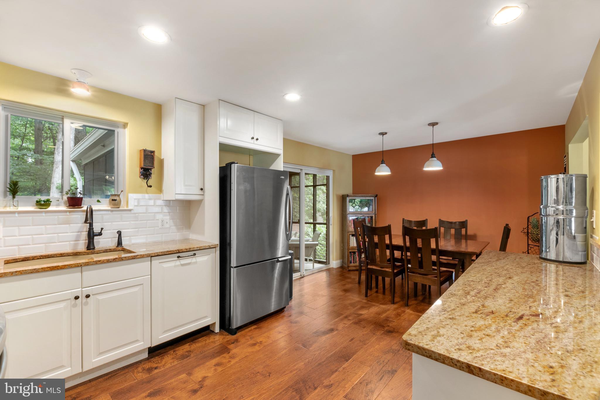 8206 Springfield Village Drive Springfield, VA 22152 - Photo 15 of 46 All and adjoining dining area