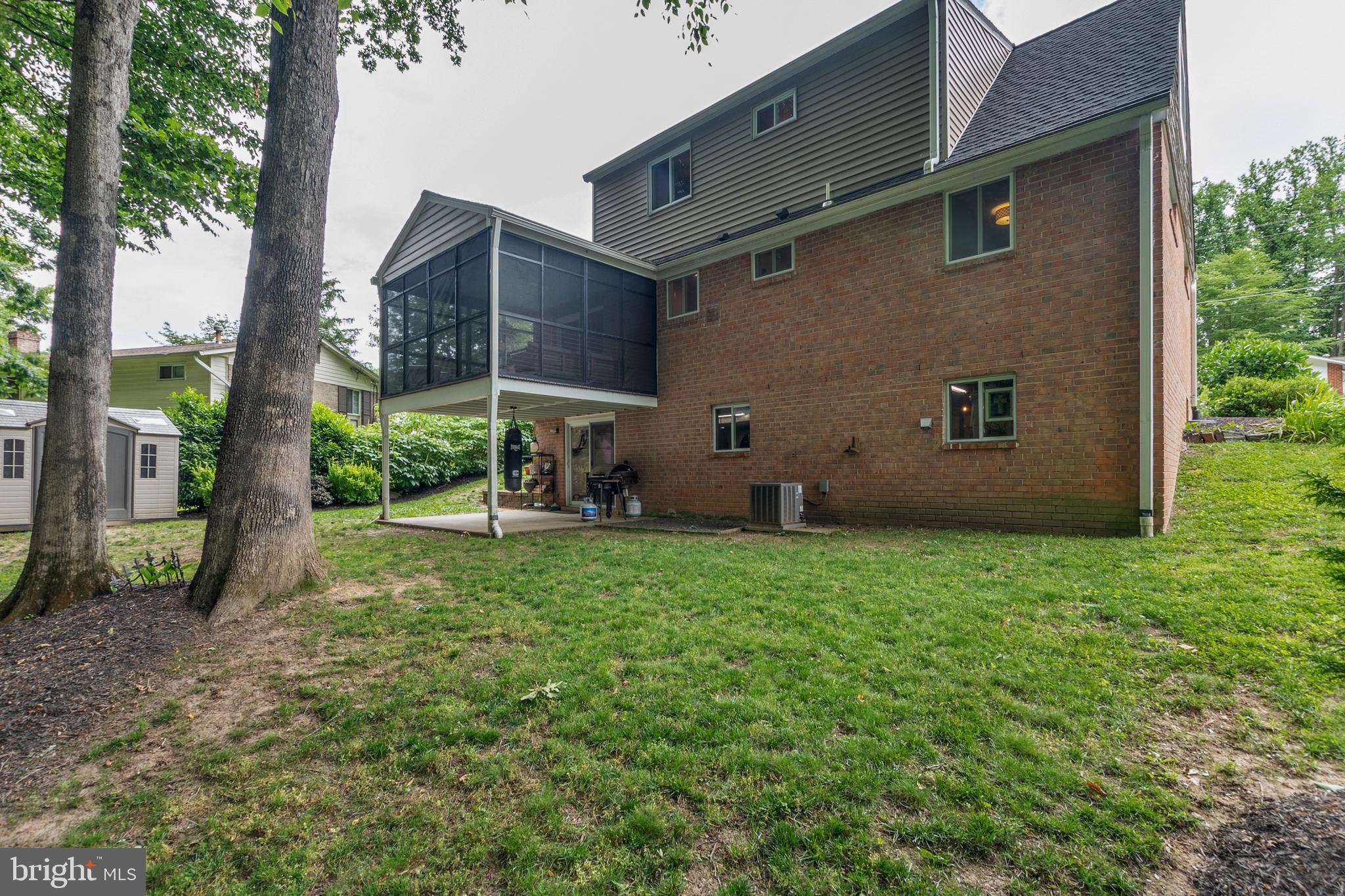 8206 Springfield Village Drive Springfield, VA 22152 - Photo 39 of 46 Spacious back yard with concrete patio