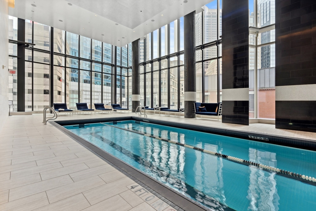 1 Franklin Street, Unit 2507 Boston, MA 02110 - Photo 24 of 37 a view of swimming pool with outdoor seating