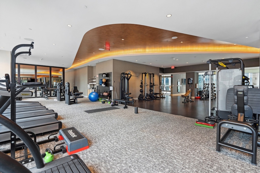 1 Franklin Street, Unit 2507 Boston, MA 02110 - Photo 25 of 37 a view of a room with gym equipment