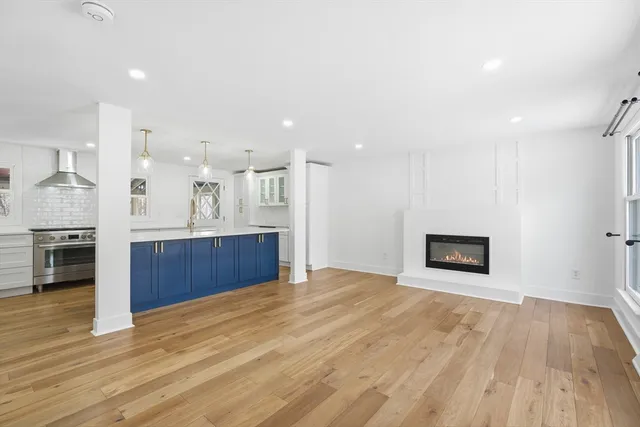 a view of kitchen with wooden floor