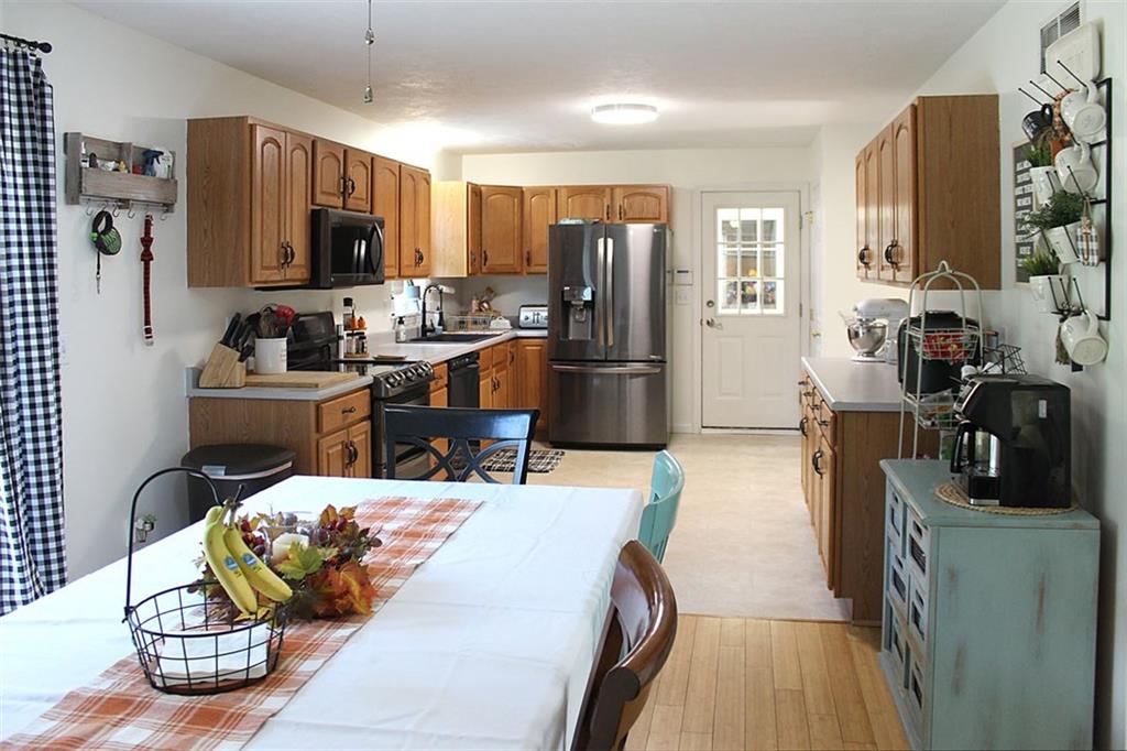 453 Hall Road Butler, PA 16001 - Photo 8 of 25 KITCHEN/DINING ROOM UPDATED WITH BRAND NEW APPLIANCES AND SINK