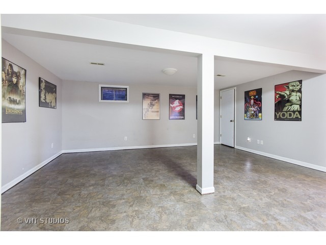 212 Chicago Road Oswego, IL 60543 - Photo 10 of 10 a view of a big room with painting of the walls