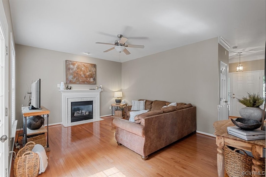 14825 Windjammer Drive Midlothian, VA 23112 - Photo 11 of 47 a living room with furniture and a fireplace