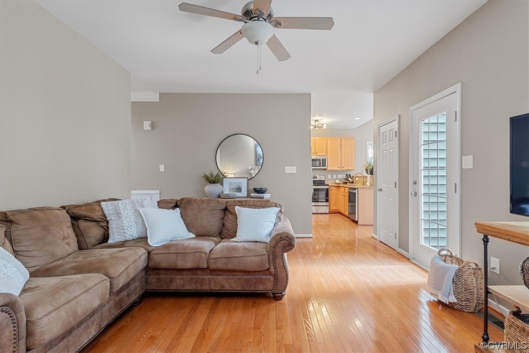 14825 Windjammer Drive Midlothian, VA 23112 - Photo 12 of 47 a living room with furniture and a wooden floor