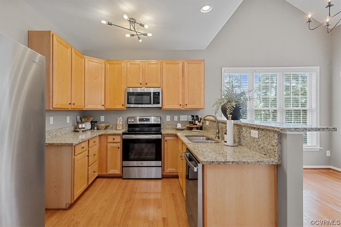 14825 Windjammer Drive Midlothian, VA 23112 - Photo 13 of 47 a kitchen with stainless steel appliances granite countertop a stove a sink dishwasher a refrigerator and a microwave oven with white cabinets
