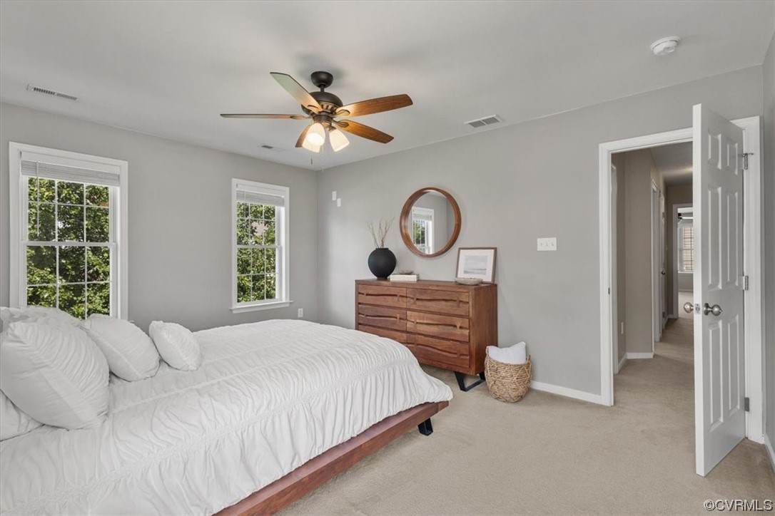 14825 Windjammer Drive Midlothian, VA 23112 - Photo 22 of 47 a bedroom with a bed and window