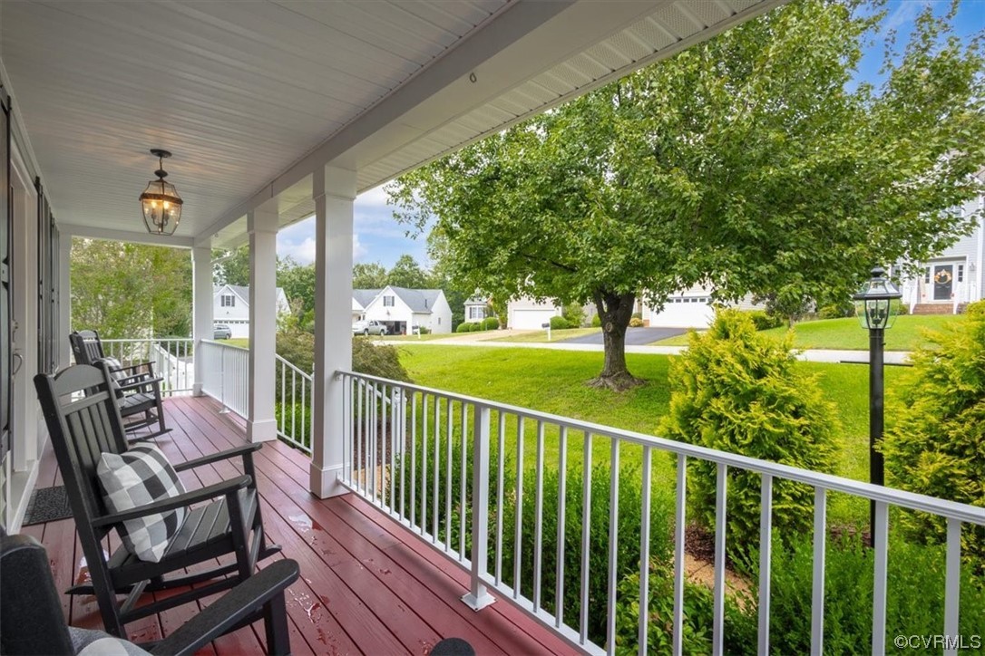 14825 Windjammer Drive Midlothian, VA 23112 - Photo 3 of 47 a view of a chairs and tables in the balcony