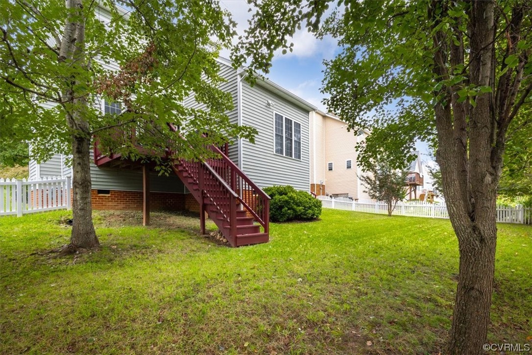 14825 Windjammer Drive Midlothian, VA 23112 - Photo 36 of 47 a view of a house with backyard and a tree