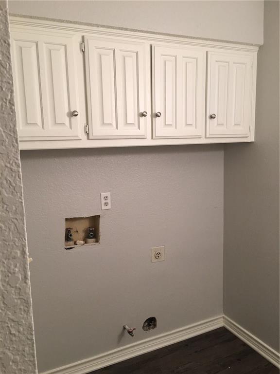 1005.5 Pine Street, Unit 1005 5 McKinney, TX 75069 - Photo 10 of 11 a view of an empty room with wooden floor