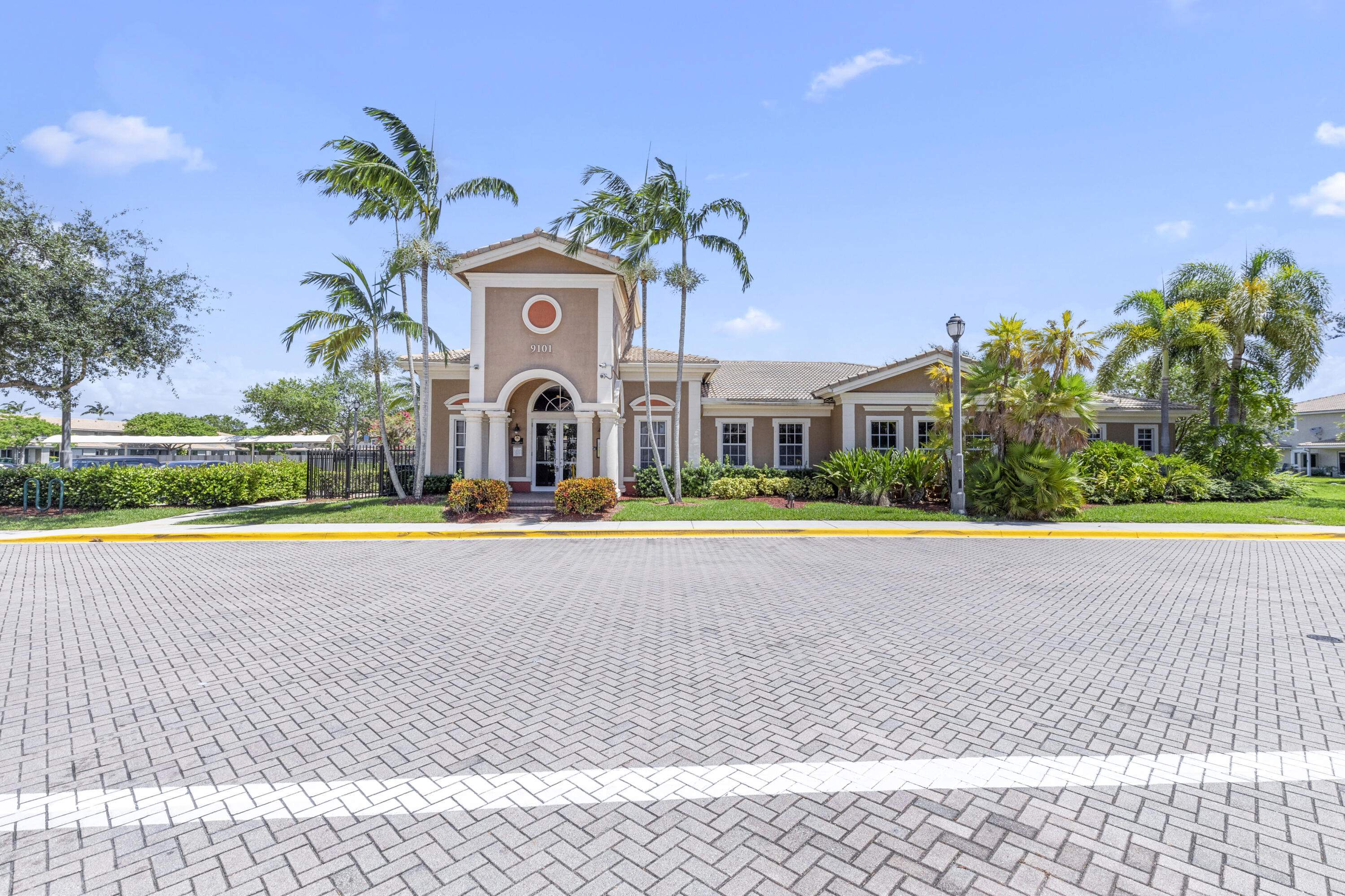 9107 Chambers Street, Unit 9107 Tamarac, FL 33321 - Photo 29 of 30 a house with a garden space