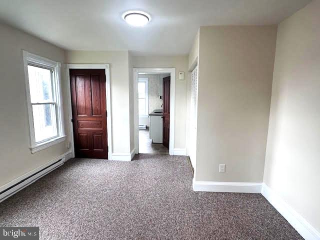 652 East Broad Street, Unit 2 Quakertown, PA 18951 - Photo 7 of 17 an empty room with windows and closet