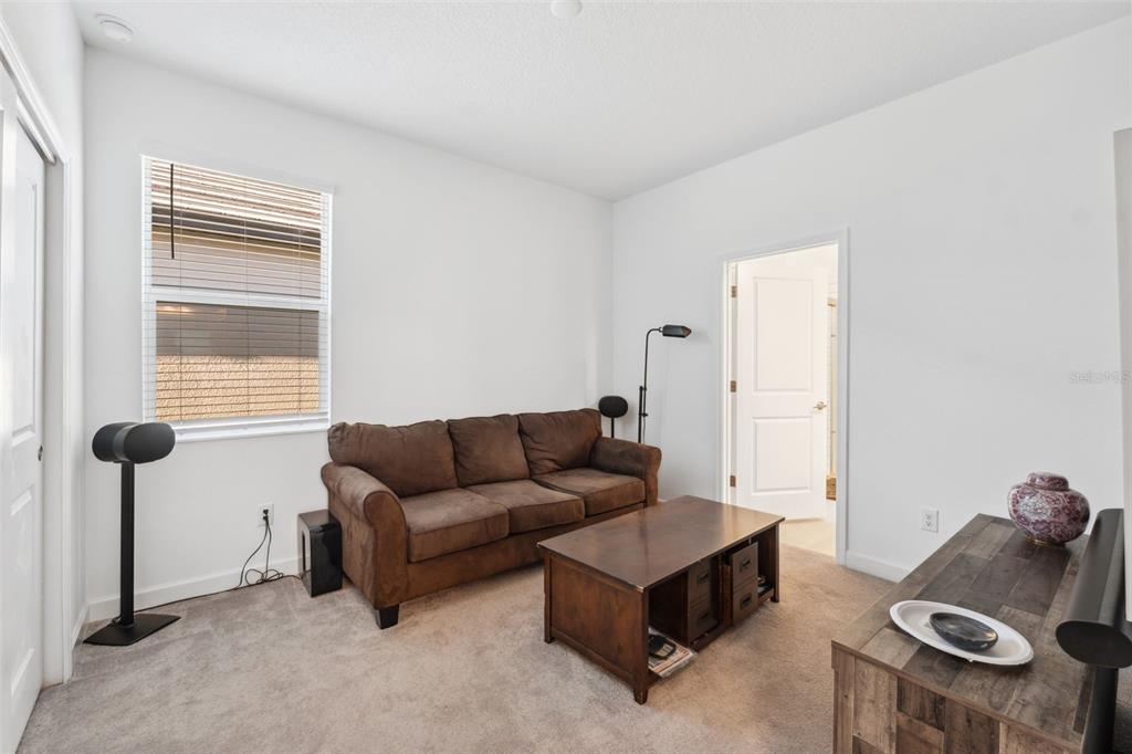 16787 Shell Bay Drive Land O Lakes, FL 34638 - Photo 18 of 54 a living room with furniture and a window