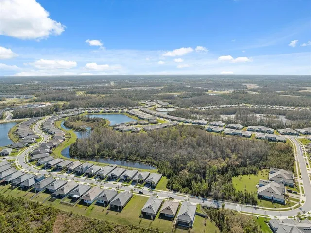 a view of a lake in middle of the town