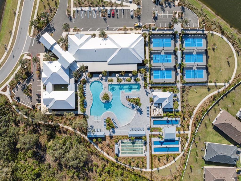 16787 Shell Bay Drive Land O Lakes, FL 34638 - Photo 53 of 54 a view of multiple houses with outdoor space