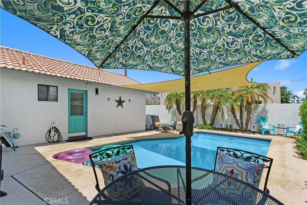 an outdoor space with furniture