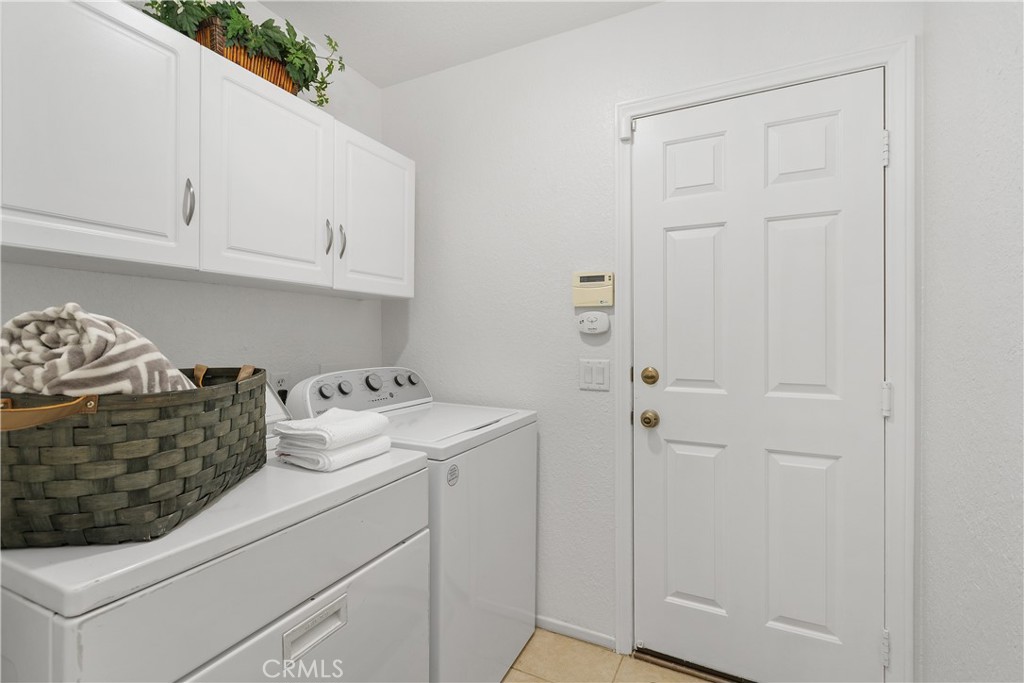 78680 Saguaro Road La Quinta, CA 92253 - Photo 18 of 30 a room with storage and utility