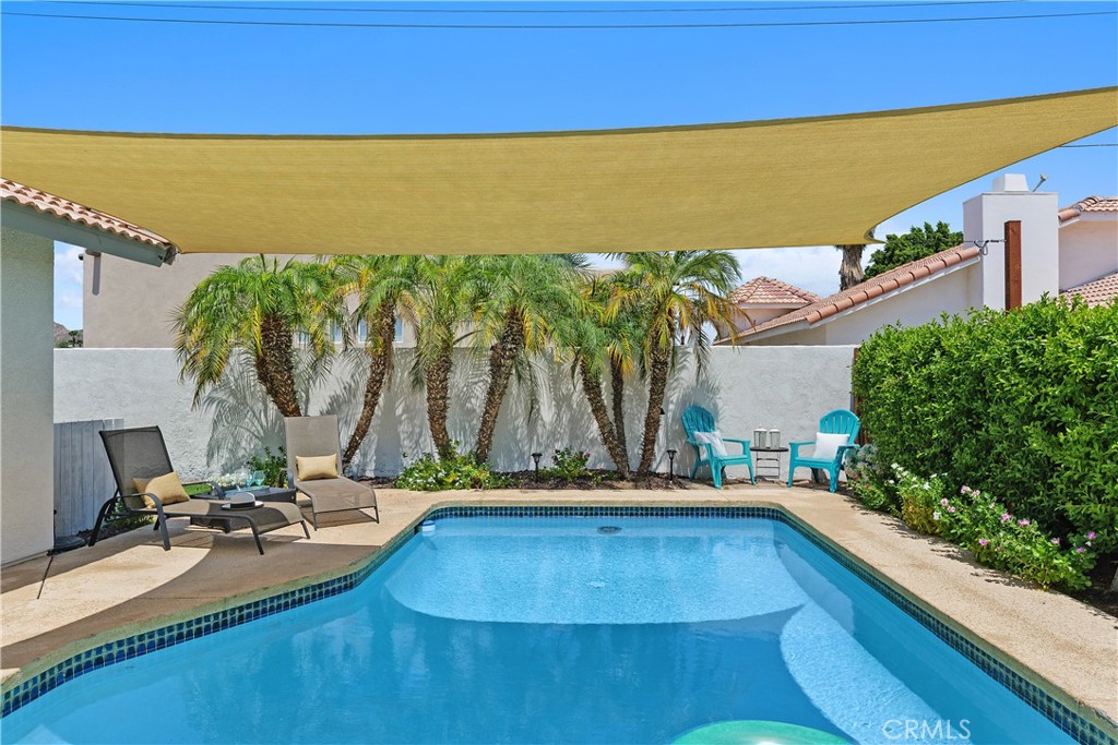 78680 Saguaro Road La Quinta, CA 92253 - Photo 28 of 30 a view of swimming pool with chairs