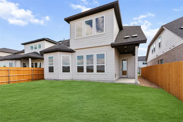 a front view of house with yard