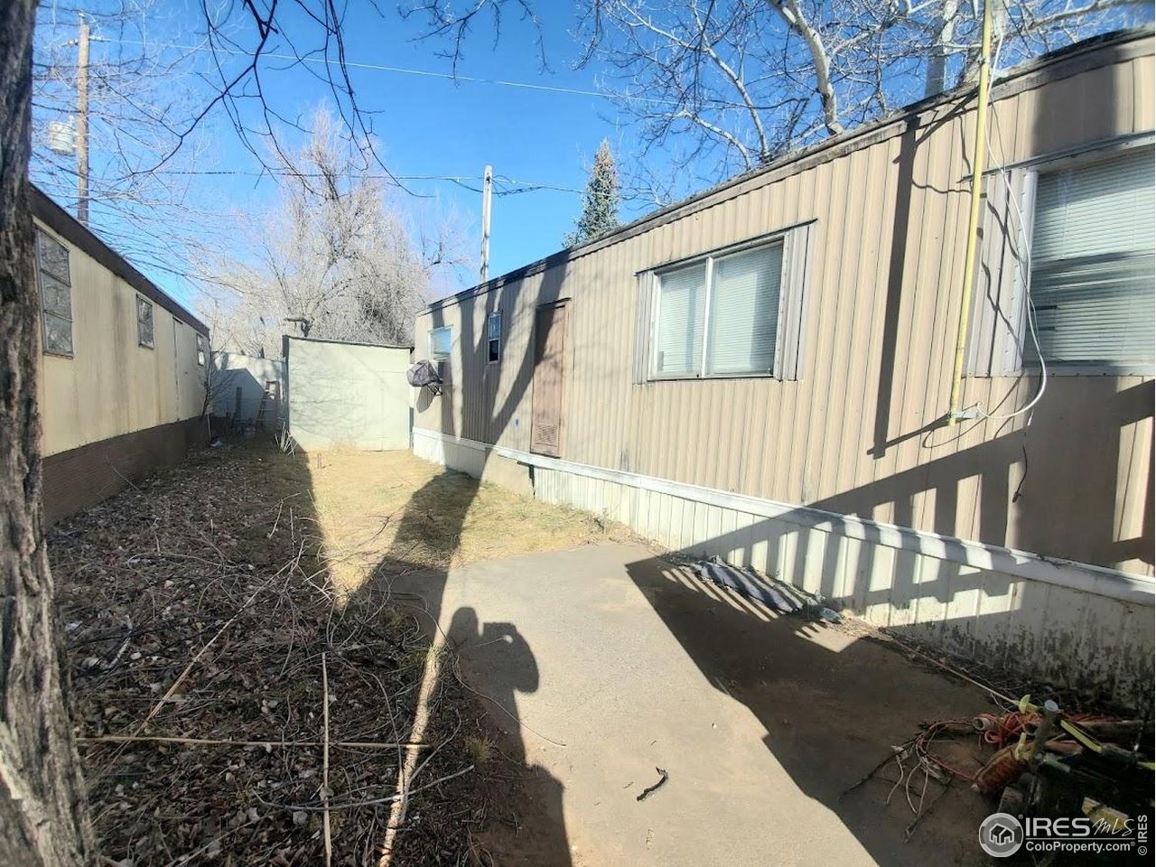 1212 Butte Road, Unit 20 Loveland, CO 80537 - Photo 20 of 22 a view of entryway with a front door